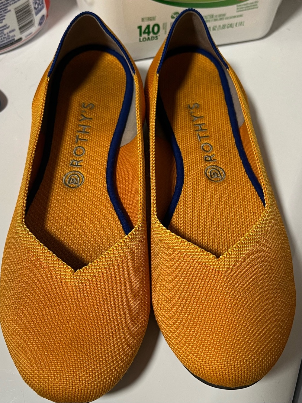 Rothy’s knit yellow flats